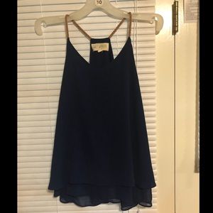 Blue tank with rope straps